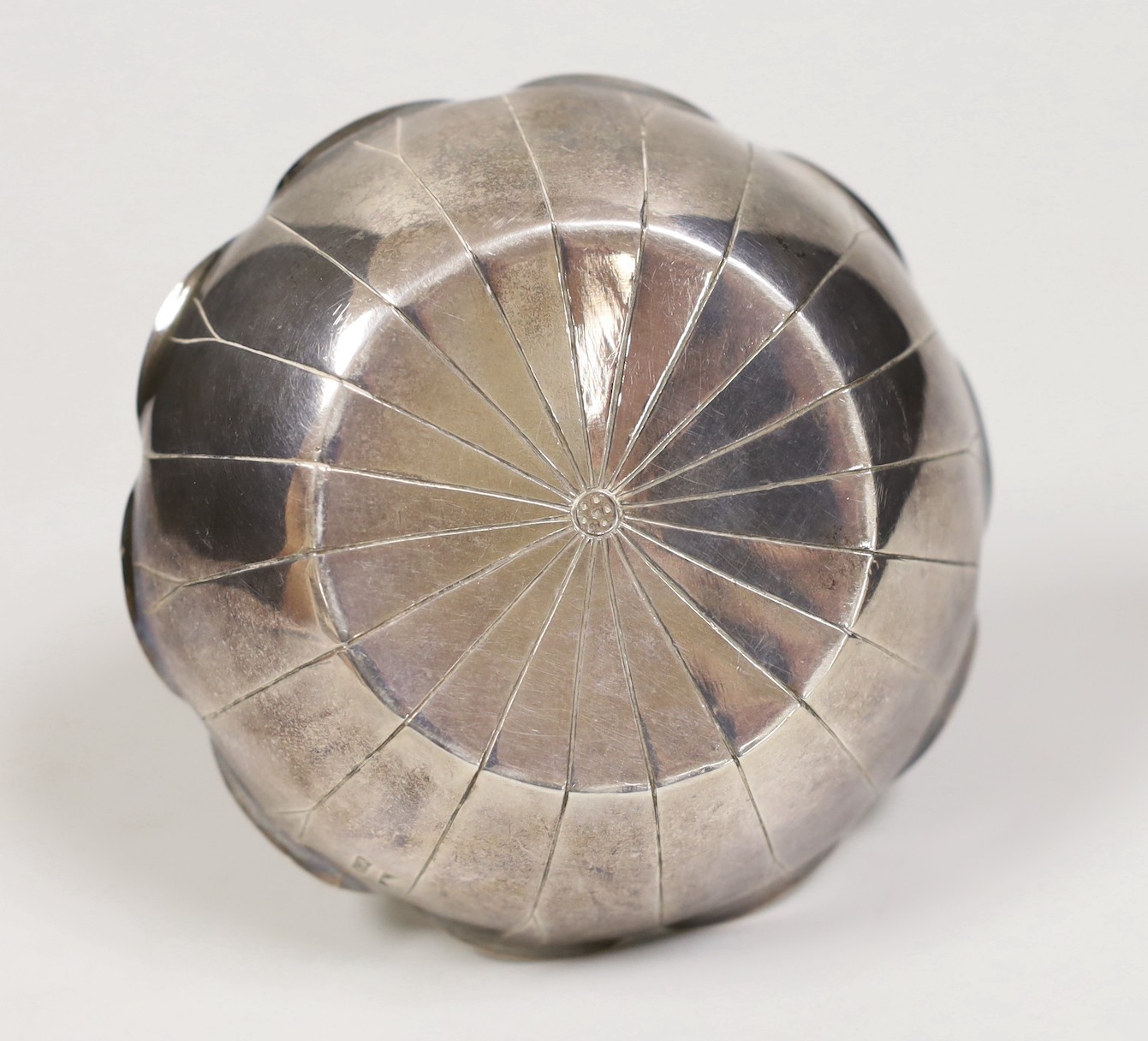 A Chinese white metal lotus leaf sweetmeat basket by Wang Hing, Hong Kong, diameter 10.7cm, 109 grams.